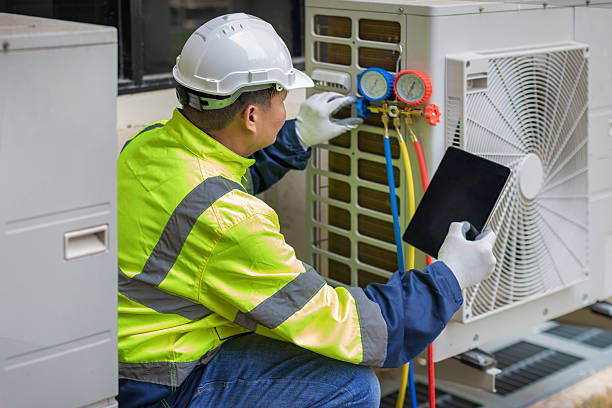 Professional Heat Pump Repair technician working in Constantine, MI